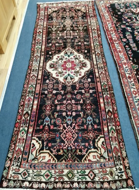 A Hamadan carpet 274 x 94cm